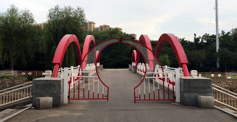 лֵ